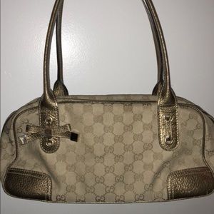 Gorgeous gold med sized gucci handbag.